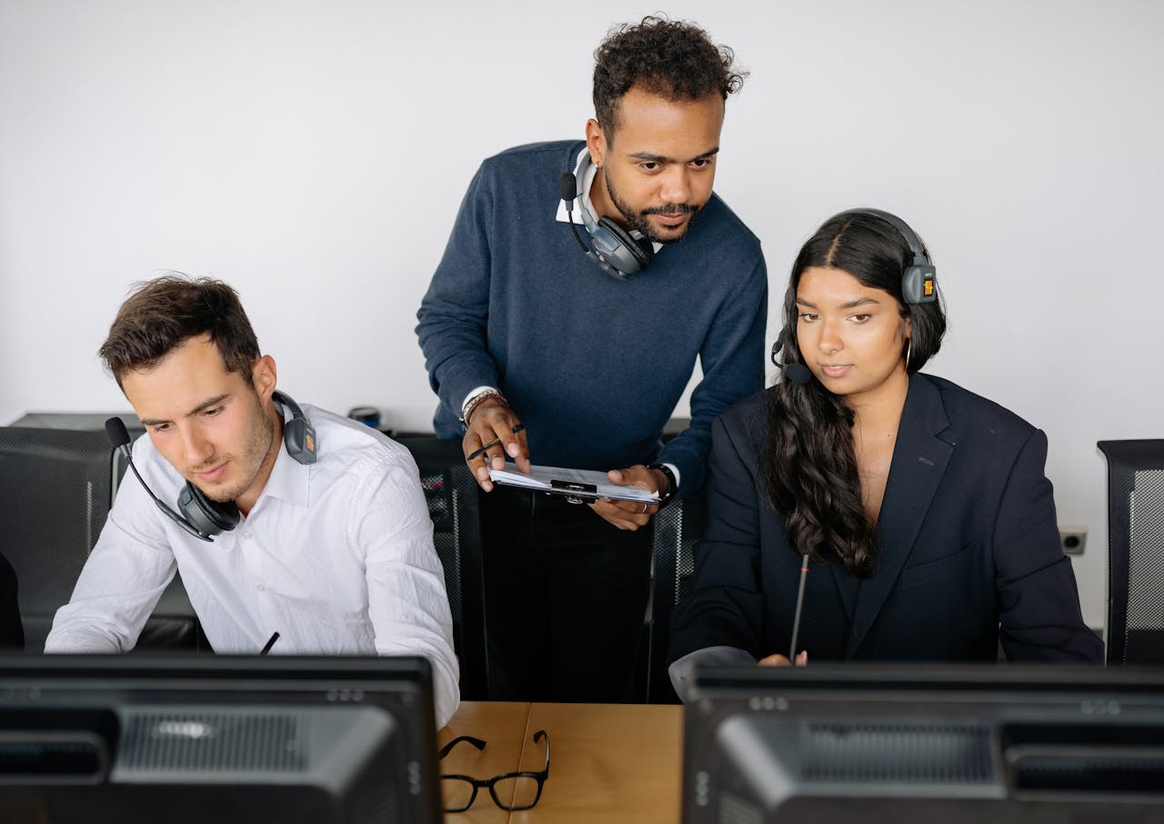 services-img Office team with headset collaboration working on a project.